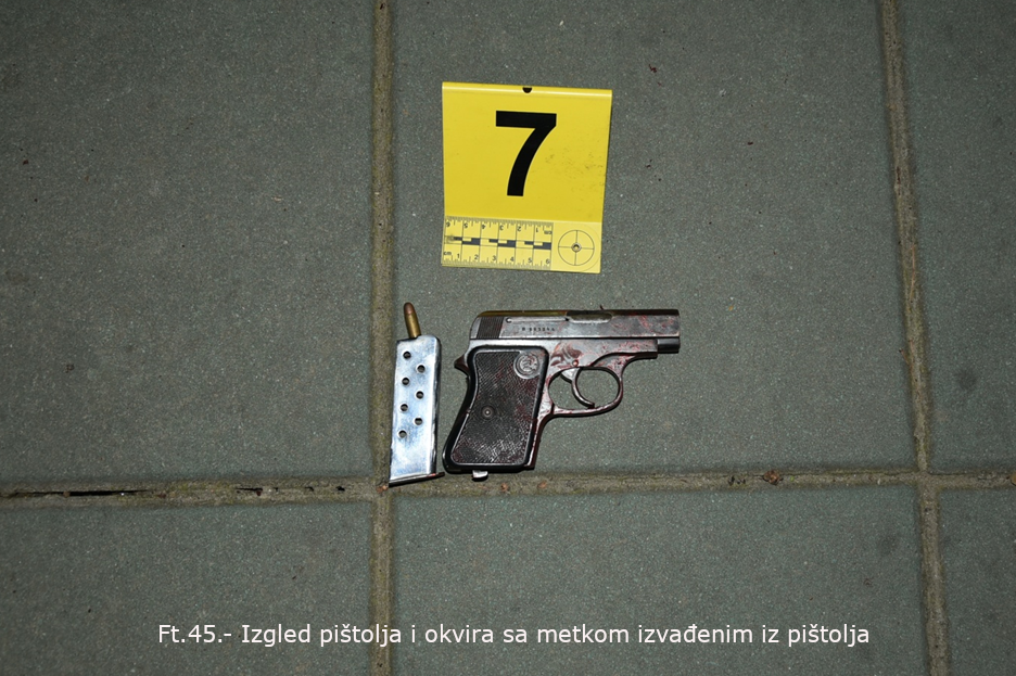 Pištolj i okvir sa metkom